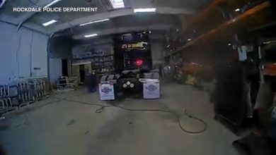 Fire in Rockdale, IL at Longhorn Trucking Company captured on police bodycam video: "Get out of the building!"